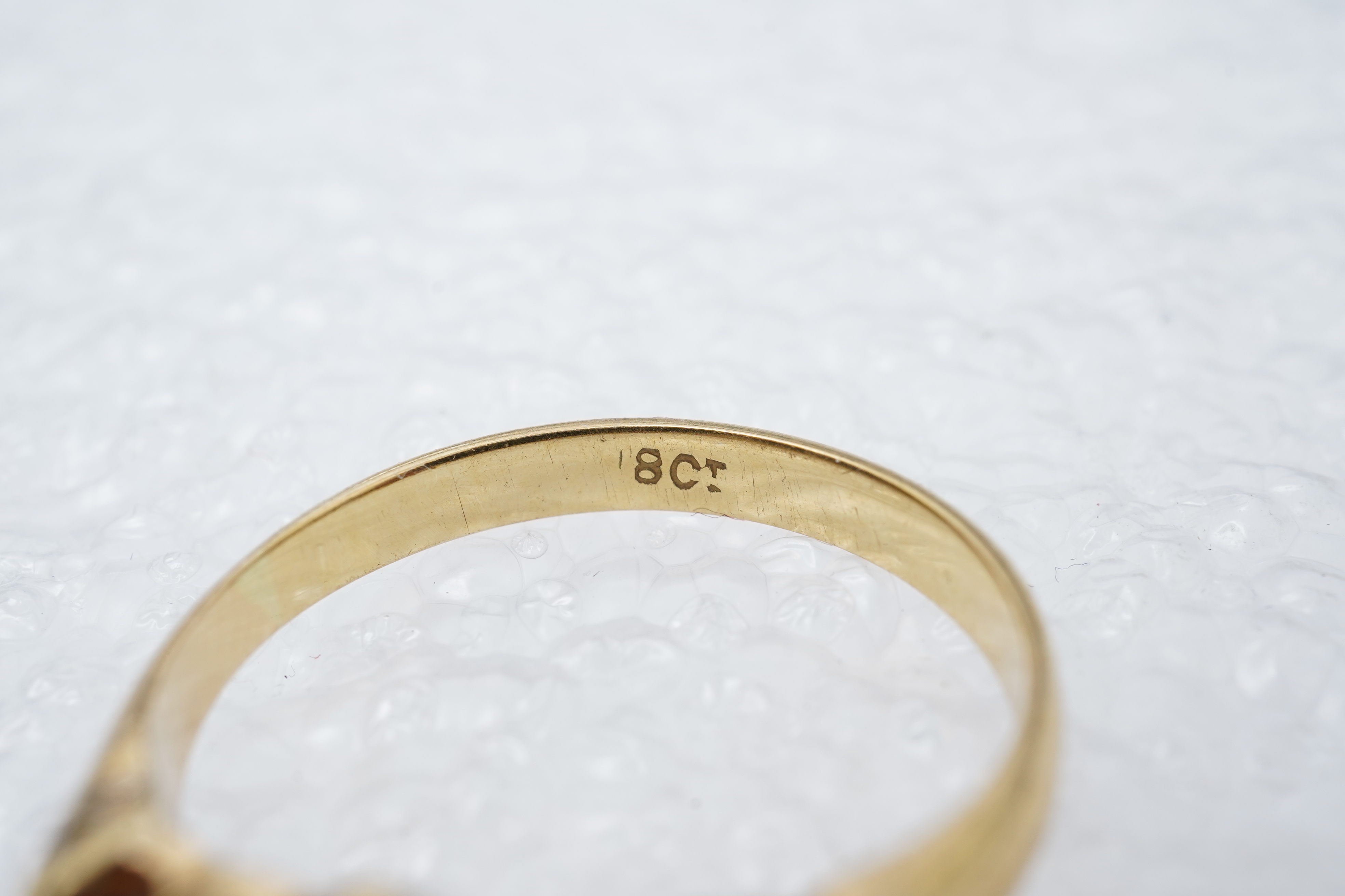 A ruby and diamond five-stone ring, circa 1900